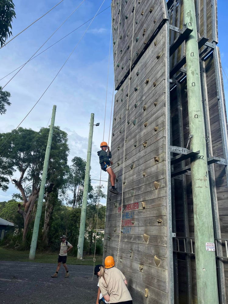 Year 7 Camp Student abseiling