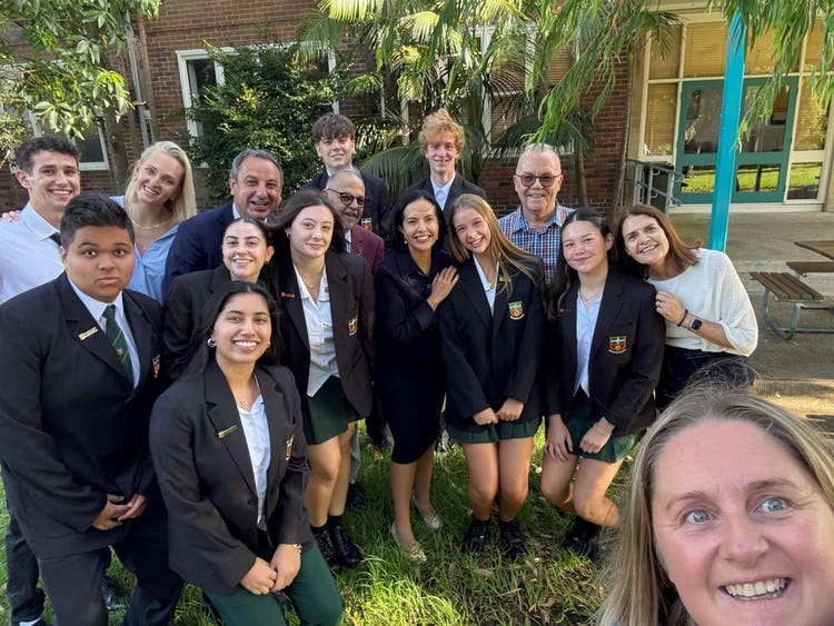 Students and staff with Premier