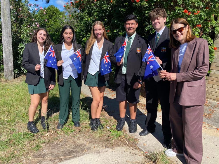 Principal & Students with Flags for Anzac Day